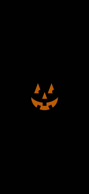 Grinende græskar Halloween iPhone baggrundsbillede — iPhone 15 Pro Wallpapers