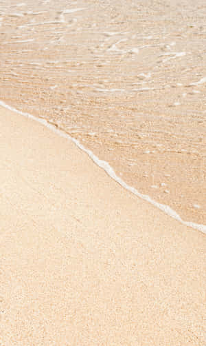 Havbølger rammer sandet på stranden — Infinix Xpad Wallpapers