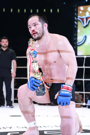 Japansk MMA-kæmper Hayato Sakurai Blodigt Ansigt — Huawei MatePad 11.5 (2026) Wallpapers