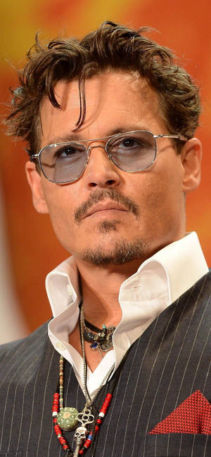 Johnny Depp amerikansk skuespiller wallpaper — iPhone 17e Wallpapers