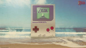 Kæmpe Nintendo Game Boy på stranden tapet