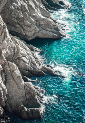 Klippestruktur og bølger tapet — Oppo Pad 5 Pro Wallpapers