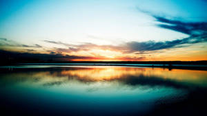 Horisont med mørkeblå solnedgang tapet. — 1600x900 Wallpapers