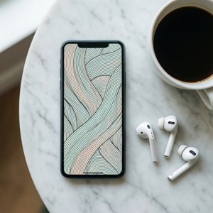 Pixel 8 fladlayout med minimalistisk tapet, kaffe og ørepropper