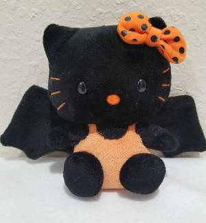 Orange-sort flagermus Hello Kitty Halloween tapet — Hello Kitty Halloween Wallpapers