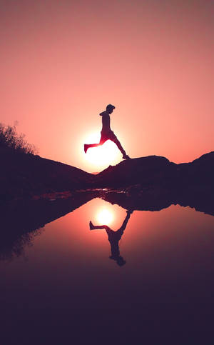 Parkourmand ved solnedgang wallpaper — RedMagic Astra 2 Wallpapers