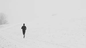 Person Løber på Snevej wallpaper — 16:9 Wallpapers