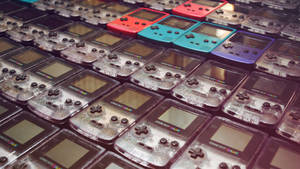 Baggrundsbillede med rækker af Game Boy Color-modeller