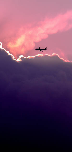 S10 Lyserød Himmel Flysilhuet baggrund — iPhone Air Wallpapers