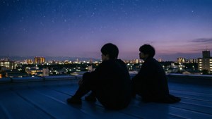 Taku og Yutaka på skolens tagterrasse i skumringen
