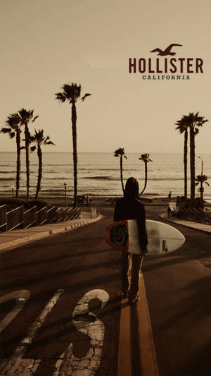 Wallpaper med Hollister-mand med surfbræt-logo. — Varm Wallpapers