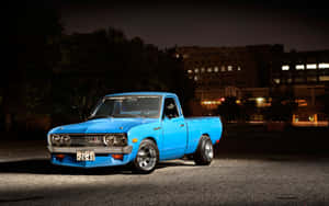 Vintage Datsun sportsvogn på vejen — MacBook Pro M1 Wallpapers