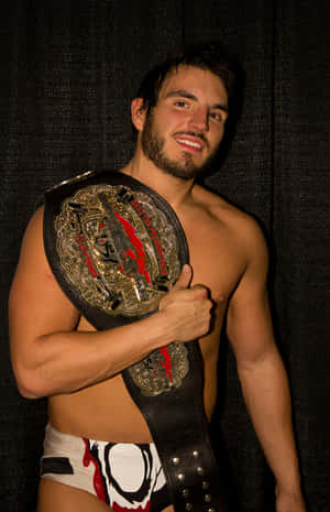 Wrestler Johnny Gargano med sværvægtsbælte — RedMagic Astra 2 Wallpapers